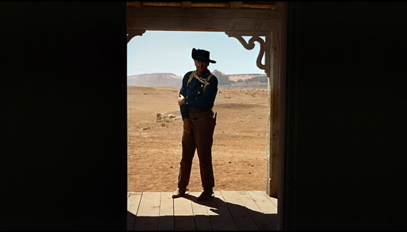 Fig. 4: The iconic final shot of The Searchers reinforces Ethan Edwards' (John Wayne) isolation from society.